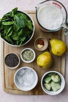 the ingredients to make this smoothie include spinach, pears, avocado, and milk