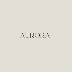 the word aurora written in black on a white background