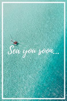 an aerial view of a boat in the ocean with sea you soon written on it