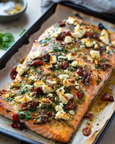 the salmon has been cooked and is ready to be served on the grilling pan