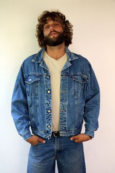 "Vintage denim jacket in blue, great faded, chest and side pockets. buttons down the front, original tag intact. aside from minor signs of wear, good vintage condition, clean, ready to wear. Great jacket Works for men and women. ** Model is 6.07 feet / 185cm for reference ** Approximate size: L- Tag size XL - please refer to the measurements. M E A S U R E M E N T S -were taken with garments laying flat, please double where necessary. ------------------------♥-------- Length : 25\"-64cm Armpit t Vintage Denim Blue Button-up Jeans, Vintage Button-up Denim Blue Jeans, Vintage Button-up Dark Wash Jeans, Vintage Medium Wash Button-up Denim Jacket, Vintage Button-up Medium Wash Denim Jacket, Vintage Light Wash Button-up Denim Jacket, Vintage Denim Vest In Medium Wash, Vintage Medium Wash Denim Vest, Vintage Medium Wash Denim Jacket