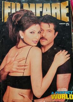 a magazine cover with a man and woman hugging each other's chests on the cover