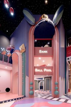 the entrance to bank ball pool is decorated in pink and blue