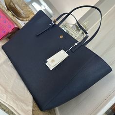 Tory Burch 134836 Emerson Navy Blue Brown With Gold Hardware Women's Large Tote Bag - Dimensions: 11" X 19" X 5" Inches Designer Navy Shopping Bag, Designer Navy Shoulder Bag For Shopping, Luxury Navy Tote Shoulder Bag, Classic Navy Shopping Bag, Elegant Navy Travel Bags, Navy Shoulder Bag With Gold-tone Hardware For Shopping, Classic Navy Bag With Gold-tone Hardware, Navy Shopping Bag With Gold-tone Hardware, Classic Navy Tote Shoulder Bag