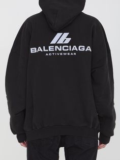 Black Archetype cotton fleece hoodie with Balenciaga Activewear logo on front and back. Includes fixed hood and front kangaroo pocket. Features gathered cuffs and waist.. Oversized fit. Size nationality: US Product number: 952083 Product code: 739024TQVT81083 Composition: 100% cotton Activewear Logo, Balenciaga Shoes, Top Designer Brands, Jeans Jumpsuit, High End Fashion, Cotton Fleece, Yoga Wear, Bold Fashion, Fashion Labels