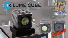 some cameras and lights are on display in front of a wall with the words lume cube