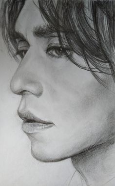 a pencil drawing of a man's face