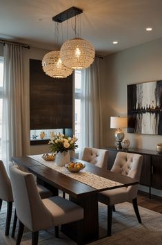 a dining room table with chairs and a chandelier