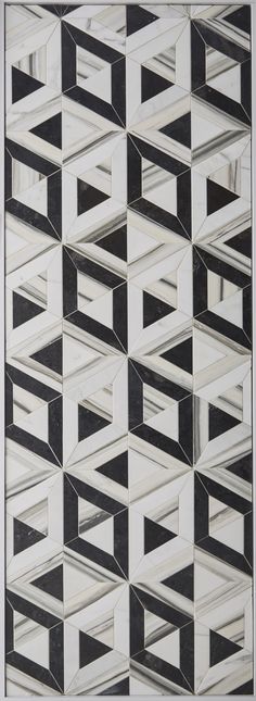 an abstract black and white tile design