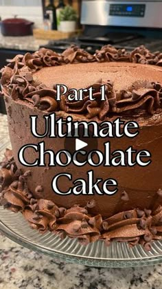 a chocolate cake with the words part i ultimate chocolate cake written on it in white lettering