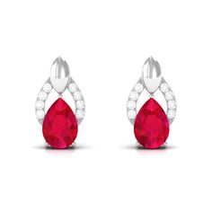 Product Details Wearing jewelry can have a transformative effect, allowing you to feel truly special and one-of-a-kind. These exquisite Teardrop Earrings are adorned with Pear Cut Created Ruby and accented with Round Shape Diamond stones, all delicately set in a prong setting. Available in a luxurious metal option, these Created Ruby Earrings are designed to capture attention and evoke a sense of elegance. Embrace your unique journey and express yourself with these stunning Designer Bridal Earri Bridal Stud Earrings, Bridal Earrings Studs, Wearing Jewelry, Ruby Earrings, Pear Cut, Diamond Stone, Bridal Earrings, Stone Earrings, Teardrop Earrings