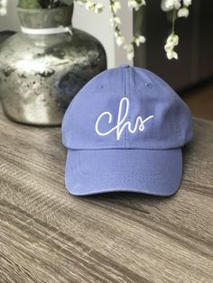 Our NEWEST addition to the Hometown line! Handwritten CHS relaxed fit hat with a gorgeous leather adjustable strap and gold detail on the back. Perfect for those sunny summer days while you're lounging at the beach or pool, preferably with one of our CHS tumblers in-hand ;) In stock and ready to ship now! Casual Dad Hat For Summer Travel, Casual Summer Dad Hat For Travel, Trendy Baseball Cap For Spring Travel, Adjustable Curved Visor Baseball Cap For Vacation, Summer Adjustable Baseball Cap With Curved Bill, Summer Everyday Dad Hat With Curved Brim, Adjustable Summer Baseball Cap With Curved Bill, Everyday Summer Dad Hat With Curved Brim, Adjustable Curved Bill Summer Baseball Cap