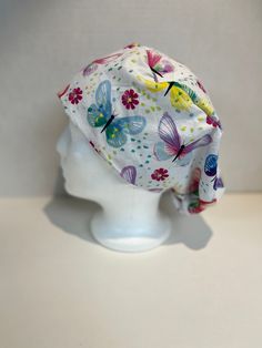 Pixie style scrub hat. Has toggle stopper for elastic on back to tighten. Holds a medium amount of hair in a bun. Outer is 100% cotton fabric, inner is polyester lining with serged/stitched seams. Hair In A Bun, Pixie Styles, Mount Vernon, Scrub Hat, Scrub Cap, Scrub Hats, Scrub Caps, Bun Hairstyles, Scrubs