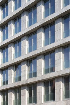 a large building with many windows on the side