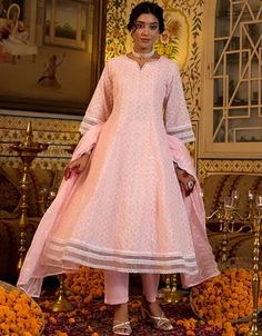 Anarkali Kurta Trouser with Dupatta Set Processing Time : 20-25 Working Days Work : Sequins work,lace work,Chikankari Work Fabric:Top : Pure Cotton Bottom : Pure Cotton Dupatta : Organza Color:Top : Baby Pink Bottom : Baby Pink Dupatta : Baby Pink Note : For A Fancy Designer Look,Grab These Lehenga Choli With Dupatta in Fine Colored.These Lehenga And Choli Are Gadhawal Silk And Dupatta Are Fabricated On Chiffon Pair.Its Beautified With Designer Printed,Jari Sequance Embroidery,Zarkan Diamond Wor Semi-stitched Lace Work Sets For Diwali, Semi-stitched Bollywood Lace Salwar Kameez, Transitional Season Fitted Mulmul Anarkali Set, Fitted Mulmul Anarkali Set For Navratri, Semi-stitched Traditional Wear With Lace Work For Eid, Traditional Cambric Anarkali Set For Wedding, Traditional Wedding Cambric Anarkali Set, Fitted Mulmul Anarkali Set With Dupatta, Fitted Anarkali Set With Dupatta In Mulmul