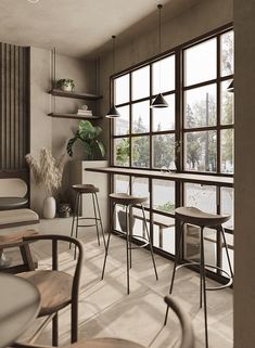 the interior of a restaurant with tables and stools in front of large windows that look out onto a street