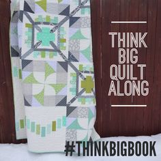 the think big quilt along book is on display in front of a wooden fence with text overlay that reads think big quilt along