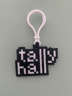 does anyone have tips for ironing more evenly? (this is with mini beads by the way) feel free to copy it i didnt make the pattern anyways lol Perler Bead Tool Pattern, Tally Hall Perler Bead, Iron Bead Patterns, Band Perler Beads, Mini Pixel Art, Funny Ties, Art Bracelet, Easy Perler Beads Ideas, Melty Beads