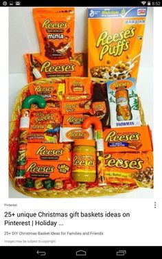 a basket filled with lots of different types of candy and snacks on top of it