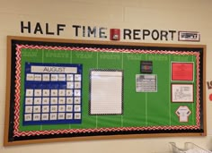 a bulletin board with writing on it that says half time report and an image of a football field