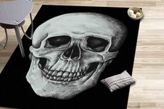 a black rug with a white skull on it