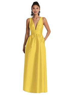 This Satiny Peau De Soie Maxi Dress With Pockets Is The Perfect Dress For A Formal Event Or Elegant Evening Soiree. A Dramatic V-neckline And Soft, Shirred Skirt Create A Bold Silhouette That's Flirty, Feminine, And Comfortable All At Once. Shown In Daffodil. Fitted Maxi Dress With Pockets For Party, Elegant Maxi Dress With Pockets, Party Dress With Pockets And V-neck, Elegant Evening Dresses With Pockets, Elegant Party Dresses With Pockets, Elegant V-neck Maxi Dress With Pockets, Chic Party Maxi Dress With Pockets, Chic Maxi Dress With Pockets For Party, Elegant Cocktail Dresses With Pockets