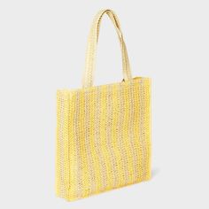 Hold your daily essentials in style with this Stripe Straw Crochet Tote Handbag from A New Day™. This fashionable tote handbag features an unstructured silhouette that's decorated with woven-texture crochet detailing with yellow and light beige stripes. The single main compartment helps keep your cellphone, wallet and more in one spot, while the double handle makes it easy to carry in hand or on your shoulder. Universal Thread™: Found exclusively at Target. Lightweight Tote Crochet Bag For Shopping, Lightweight Crochet Shopping Tote Bag, Lightweight Crochet Tote Bag For Shopping, Trendy Lightweight Rectangular Bags, Lightweight Crochet Bag For Shopping, Lightweight Rectangular Shoulder Bag For Shopping, Large Casual Shoulder Bag For Summer, Large Summer Bags With Braided Handles, Yellow Crochet Bag With Braided Handles For Shopping