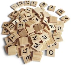 wooden scrabbles with letters spelling out the word love