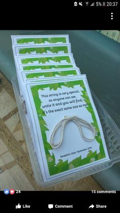 a stack of cards sitting on top of a wooden table