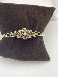 14K Yellow Gold Garnet Bangle & pearl Bracelet Vintage Fine Estate Jewelry. Condition is Pre-owned. Bracelet approximately weighs : 14.50 grams Pearl Bangle Bracelet, Pearl Bangle, Bracelet Vintage, Fine Jewellery Necklace, Estate Jewelry, Pearl Bracelet, Bangle Bracelet, Garnet, Jewelry Necklace Pendant