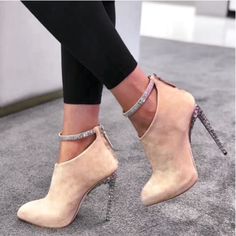 Giuseppe Zanotti For Jennifer Lopez. Suede Bootie Featuring Faceted Crystal Trim, 120-Mm Crystal And Mirrored Stiletto Heel, Pointed Toe, An Ankle Strap, Back Zip, Padded Leather Insole And A V-Shaped Vamp. Color: Nude Material: Sude Size: 38eu Heel Height: 120 Mm / 4.7" Condition: New No Box Eu38 Glamorous Ankle Boot Heels For Formal Occasions, Glamorous Formal Ankle Boot Heels, Designer Ankle Strap Boots For Party, Elegant Beige Ankle-high Heels, Beige Pointed Toe Party Boots, Elegant Ankle-high Suede Heels, Elegant Almond Toe Boots For Party, Chic Beige Evening Boots, Chic Beige Boots For Party