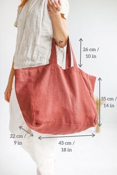 a woman carrying a red bag with measurements