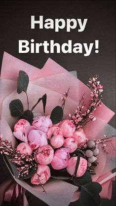 a bouquet of pink flowers with the words happy birthday