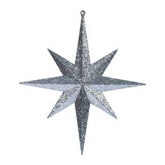 a silver glittered star ornament hanging on a white background with clipping