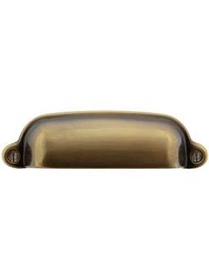 an antique brass door handle on a white background