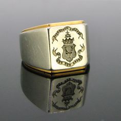 Weight:18.75gr Metal:18kt Yellow and white gold Condition:Very Good Hallmarks:French, eagle's head Comments:This vintage family crest ring is in very good vintage condition. The crest is beautifully detailed and engraved with the Scottish clan coat of arms of the Mackenzie. It is written Roderic Mackenzie above and Luceo non uro under the crest, which means I shine, not burn in latin. It is made in 18kt yellow and white gold, and controlled with the French eagle's head. Dimensions: *Height:22.52 Wax Seal Ring, Family Crest Ring, Family Crest Rings, Custom Signet Ring, Vintage Family, Family Rings, Signet Ring Men, Scottish Clans, Gold Signet Ring