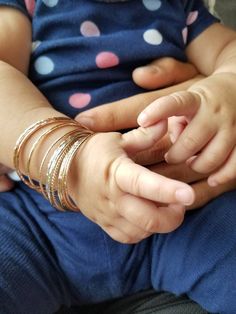 Baby Bangle - 2 Baby Bracelets - Gold Baby Bangle Bracelet - 1st baby birthday present - stack of bangles for baby girl - bangle to earrings for mom! This listing is priced for 2 bangles which will transform into a pair of earrings. If you order more than 1 pair, please add note to seller of the different size and material you would like. Bangles come in 4 different sizes: Newborn = 4.5 inch circumference Crawler= 5 inch circumference Toddler/Walker = 6 inch circumference Preschool: 6.5 inch cir Baby Bracelet Gold, Newborn Baby Girl Gifts, Unique Gifts For Girls, Baby Bangles, The Bangles, Jewelry Bracelets Gold, Baby Bracelet, Bracelets Gold, Gold Baby