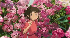 an anime character standing in front of pink flowers