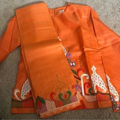 Brand New! Top, Skirt, Dupatta/Shawl Long Sleeves Embroidery Work Round Neck Hook Closure On Back Neck Slits On The Side Of Blouse Chest: 38” Top Length: 24” Drawstring Skirt Open To Offers! Orange Sets With Resham Embroidery For Spring, Orange Resham Embroidery Sets For Spring, Spring Orange Sets With Resham Embroidery, Spring Orange Resham Embroidery Sets, Silk Traditional Wear With Traditional Drape For Spring, Traditional Orange Sets For Spring, Traditional Ceremonial Sets For Spring, Traditional Orange Silk Set, Traditional Orange Dupatta For Spring