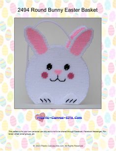 an easter bunny basket with pink ears on it