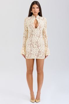 DESCRIPTION: The dress is our beautifully feminine mini dress in a delicate floral lace. This enchanting design features a high neck and a peek-a-boo keyhole front. It has a bodycon silhouette for a snatching fit. enhanced by the inner mesh layer that also works well for the perfect coverage. The long sleeves have pretty fluted cuffs and it zips to the side for easy on. For the most elegant look. pair yours with vertiginous tonal heels.  WHERE TO WEAR: Pretty date nights. romantic dinner dates. Feminine Luxury, Neutral Heels, Mom Clothes, Keyhole Neckline, Romantic Dinner, House Of Cb, Date Nights, Lace Mini Dress, Bottom Clothes