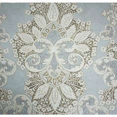 a blue and white wallpaper with an intricate design on it's surface,