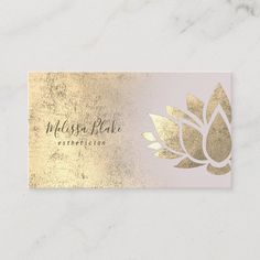 gold foil lotus business card on a marble surface with the words, mesmblake