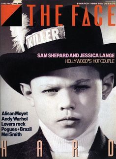 a magazine cover with a man wearing a hat