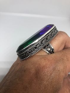 Large brilliant antique glass Ornate German Silver Vintage ring, does not tarnish Size 9 can be re sized All rings are shipped in a nice gift box. Check out our over a THOUSAND great reviews Engraving is $4 per letter and is not always perfect depending on the piece. It can take a few days if the jeweler is busy. This is payable to Paypal Judithsltd@gmail.com Iridescent Oval Crystal Ring For Gift, Iridescent Spiritual Rings As Gifts, Vintage Crystal Ring With Stone Setting As Gift, Iridescent Oval Crystal Ring As Gift, Iridescent Oval Crystal Ring Gift, Antique Crystal Ring As Gift, Antique Silver Crystal Ring As A Gift, Vintage Open Crystal Ring Gift, Vintage Open Crystal Ring As A Gift