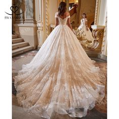 a woman in a wedding dress is looking at her reflection