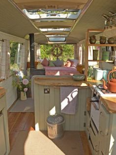 the inside of a camper is clean and ready to be used as a kitchen