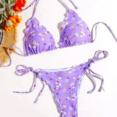 Cute Ditsy Floral On A Lilac Purple Background. Tie Closure And Tie Sides. Has A Frill Detail. Triangle Halter Top. Removable Pads, Lined, Wireless. Stretchy. Bikini Style Bottoms For Cheeky Coverage. Made Of 82% Polyester 18% Spandex. Hand Wash Cold, Lay Flat. Size: Large Bust: 37.8" Waist: 29-40" Top Length: 7.9" Bottom Length: 9.8" Brand New, Price Firm, Bundle For A Better Savings And One Shipping Rate, If 5 Pounds Or Less. Bundle And Ask Questions. I'll Be Happy To Help You. Purple Tie-side Swimwear Bottom For Spring, Purple Tie-side Bottom Swimwear For Spring, Purple Beachy Swimwear For Spring, Purple Halter Neck Swimwear For Spring, Purple Floral Print Summer Swimwear, Purple Floral Print Swimwear For Beach, Purple Floral Print Swimwear For Vacation, Purple Floral Print Swimwear For Summer, Purple Floral Print Beachwear Swimwear