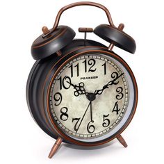 an old - fashioned alarm clock is shown with the hands pointing to five o'clock