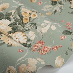 a floral wallpaper with many flowers on it